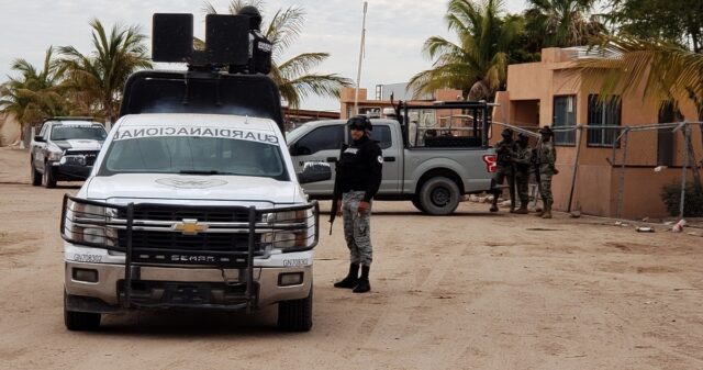 Fuerzas policiacas y militares presentes en la Agropecuaria Malichita, tras el ataque armado.